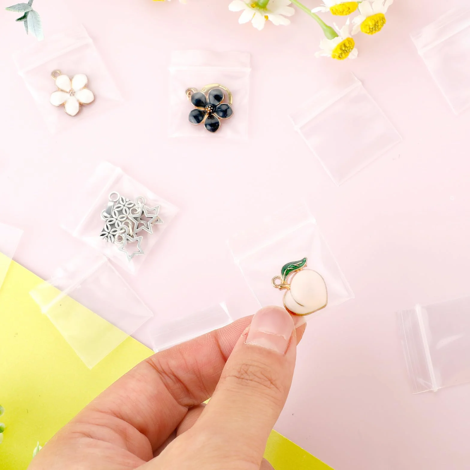 JJUNW 200 sztuk plastikowych woreczków na zamek błyskawiczny, 25 x 30 mm, mini torebki z zamkiem błyskawicznym, torebki plastikowe z zamkiem błyskawicznym, przezroczyste, zamykane na zamek