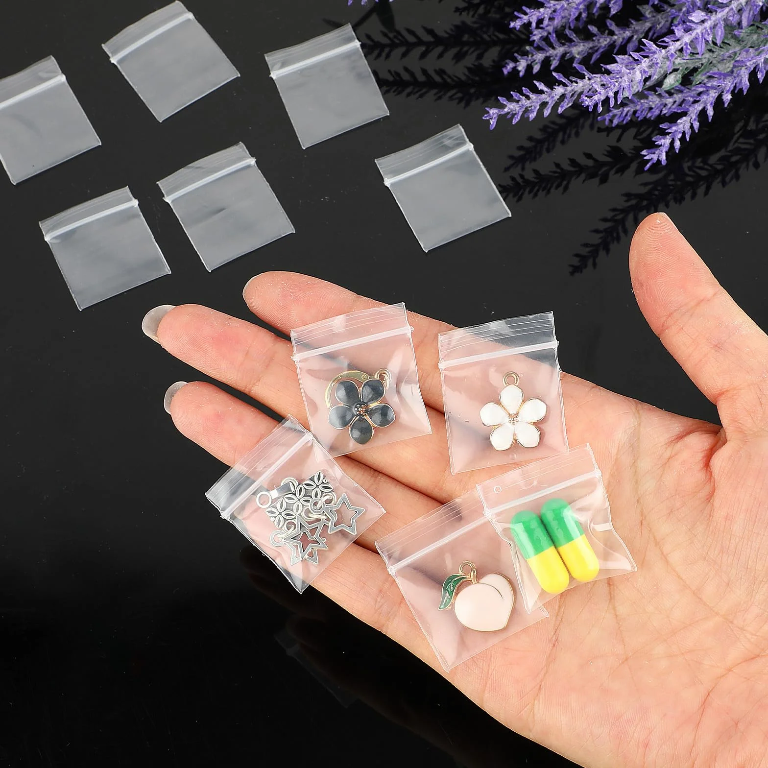 JJUNW 200 sztuk plastikowych woreczków na zamek błyskawiczny, 25 x 30 mm, mini torebki z zamkiem błyskawicznym, torebki plastikowe z zamkiem błyskawicznym, przezroczyste, zamykane na zamek